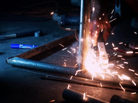 welder spark industry factory steel safety manufacturing skill equipment metal work job labor engineer construction glowing light energy effect particle shiny technician burn flash iron fire mask photo