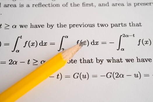 Pencil on mathematic formula exercise test paper in education school. photo