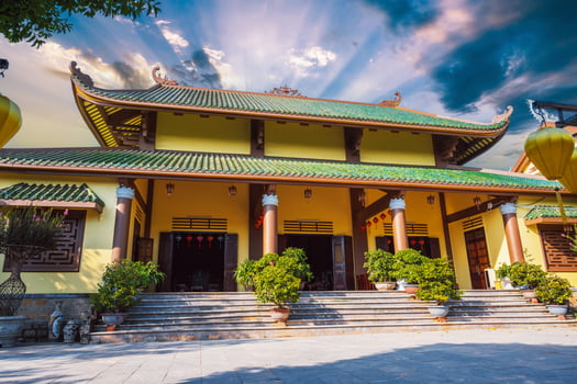 Buddhist temple at Linh ung Pagoda in Da Nang in Vietnam at sunrise in summer in Asia photo