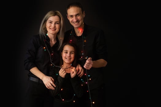 Family portrait on black background. photo