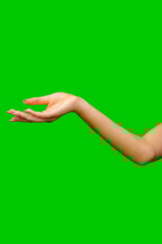 Woman Holding Out Hand on Green Screen photo