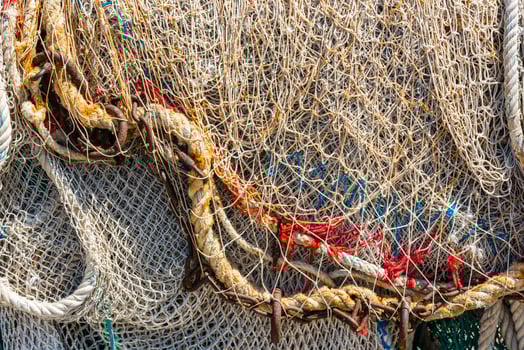Old color fishing nets and ropes photo