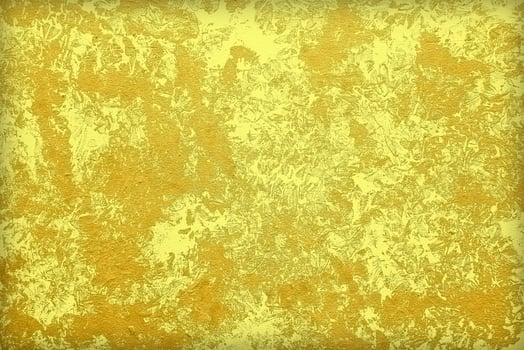 Fortuna Gold Grunge Painting on Wall for Background. photo