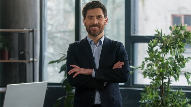 Caucasian man looking camera phone successful mature businessman entrepreneur leader employer professional manager indoors male business portrait financial boss broker finance expert agent lawyer photo