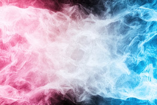 Vibrant smoke swirls of pink and blue photo