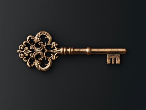 Ornate antique key on dark background photo