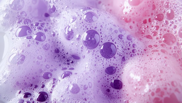 Vibrant purple and pink water droplets photo