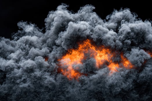 A large cloud of smoke is shown on a black background photo