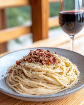 Delicious spaghetti with tomato sauce and red wine photo