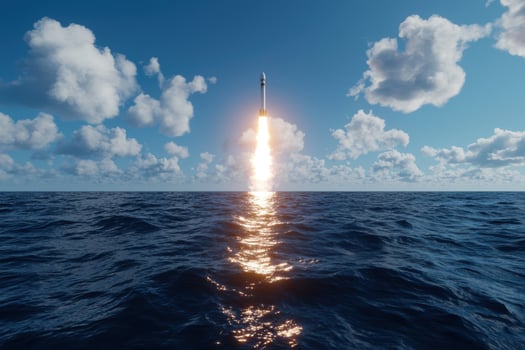 Rocket launch over the ocean photo