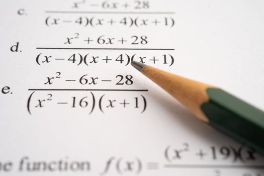 Pencil on mathematic formula exercise test paper in education school. photo