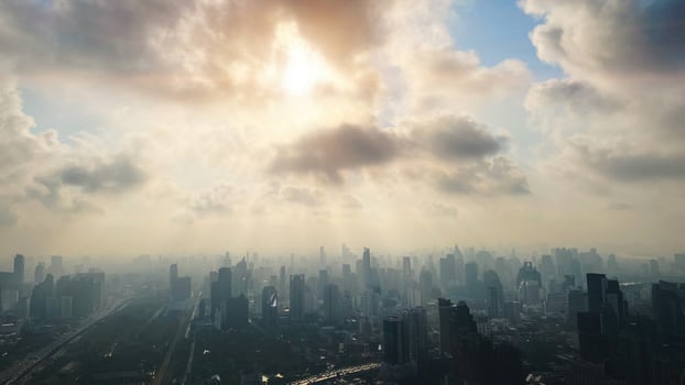 brightness heaven sky sun light rays above city metro building morning day landscape wide panoramic for banner background photo