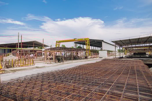 Precast concrete casting manufacturing plant, Cement products large construction site yard business industry. photo