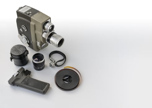 Vintage 8mm camera with 8mm reel and accessories. photo