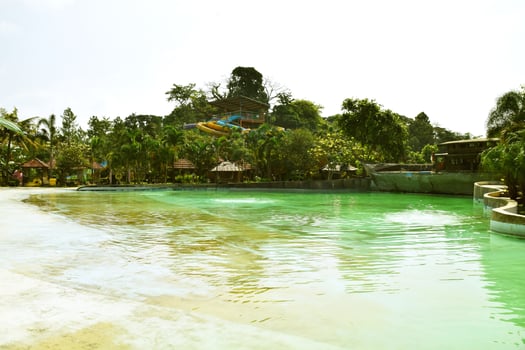The atmosphere of the wave pool at the water park in Kuningan photo