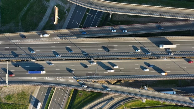 Lot of cars on modern road junction photo