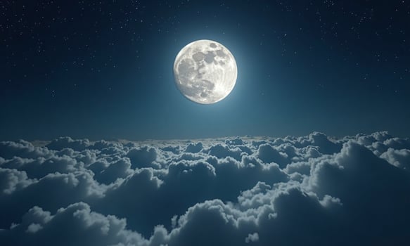 Full moon above clouds night sky starry background photo