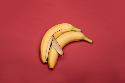 bananas on red background photo