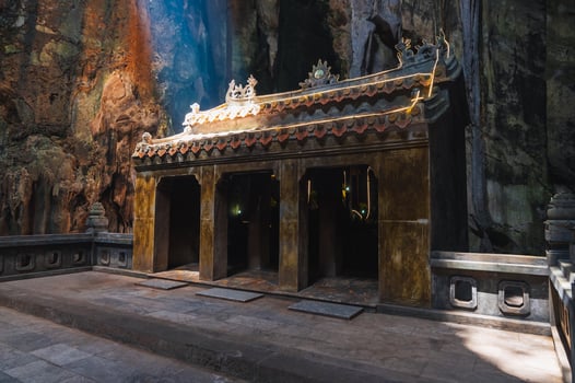 Asian Buddhist temple inside Huyen Khong Cave in the Marble Mountains in Da Nang, Vietnam photo
