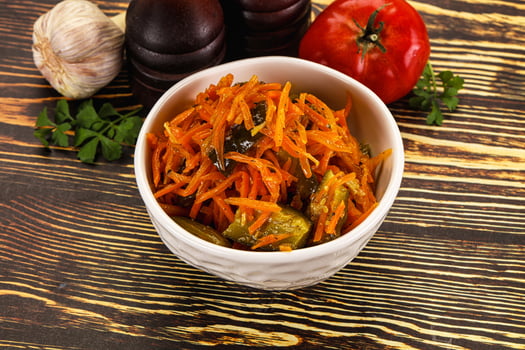 Salad with korean carrot and cucumber photo