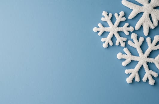 Snowy Snowflakes on Blue Background photo