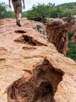 Hiking through rugged terrain photo