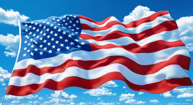 American flag waving under a bright blue sky. The American flag flutters gracefully against a backdrop of fluffy white clouds and a vivid blue sky, symbolizing patriotism and unity. photo