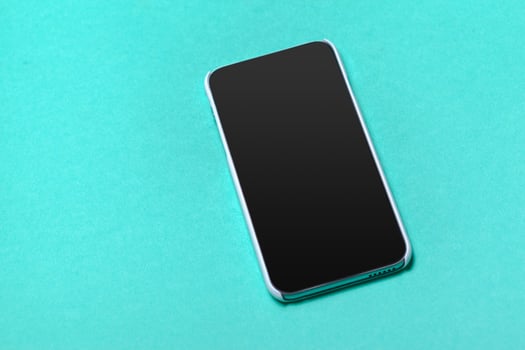 Black smartphone on the table photo