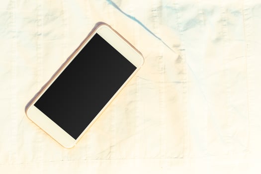 Top view smartphone mock up template with black screen photo