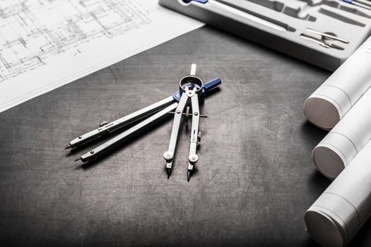 Construction planning drawings on black background photo