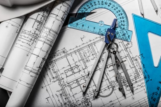 Construction planning drawings on black background photo