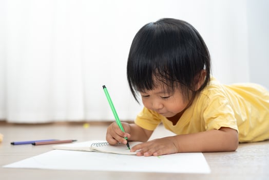 Happy children playing learning paint on paper. Activity, development, IQ, EQ, meditation, brain, muscles, essential skills, family having fun spending time together. Holiday photo