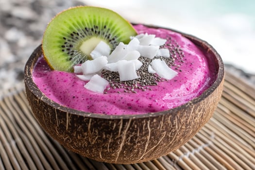 Healthy tropical smoothie bowl with kiwi and coconut photo