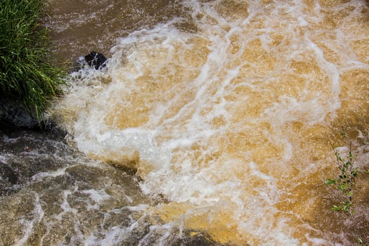 Detail of the force of the water at the edge of the Iguazu Falls, Misiones, Argentina photo