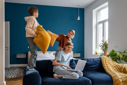 Young woman mother freelancer combining remote work with spending more time with family photo