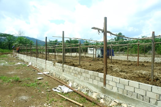unfinished architectural buildings made of concrete and wood photo