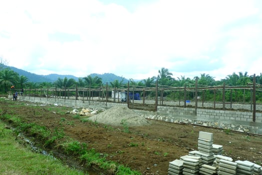 unfinished architectural buildings made of concrete and wood photo