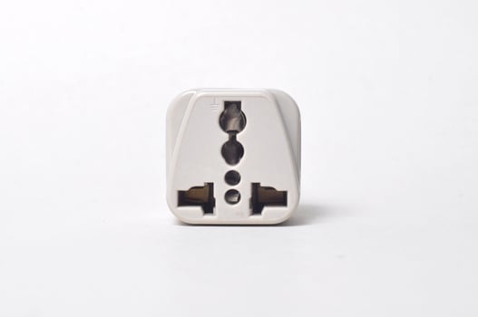 Close-up electrical adapter on white background photo