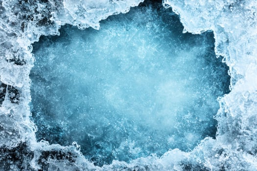 Frozen winter landscape with ice and snow photo
