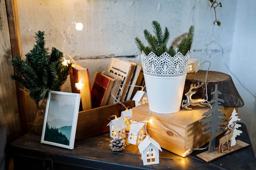 Christmas lights in the interior, Christmas tree with a garland, selective focus, blurred background, evening shooting, holiday atmosphere, picture with noise photo