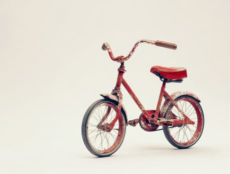 retro, rusted bicycle on white background photo