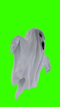 ghost in a white sheet with green background photo
