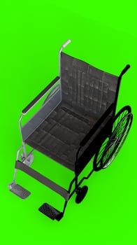 wheel chair with green background photo