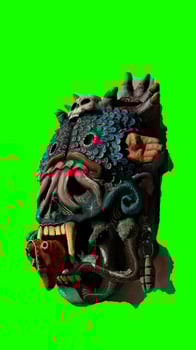 painted tiki mask with green background photo