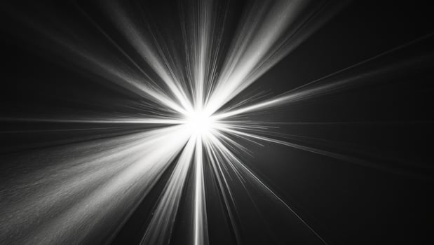 A black and white photo of a starburst