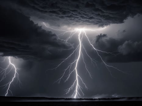 Lightning strikes over a dark sky with clouds photo