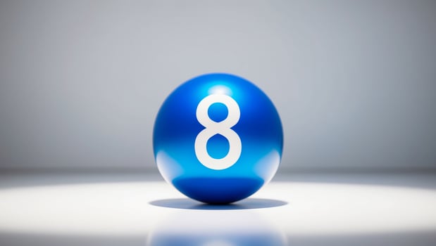 A blue ball with the number eight on it photo