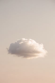 A single cloud floating in the sky photo
