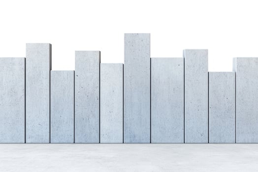 Modern concrete blocks form an abstract skyline, showcasing simplified architectural design elements and textures. photo