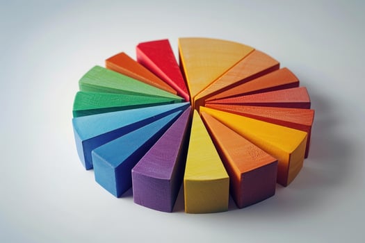 Colorful wooden blocks forming a circle on white background photo